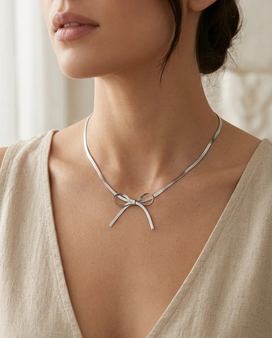 Sleek Metallic Statement Bow Choker