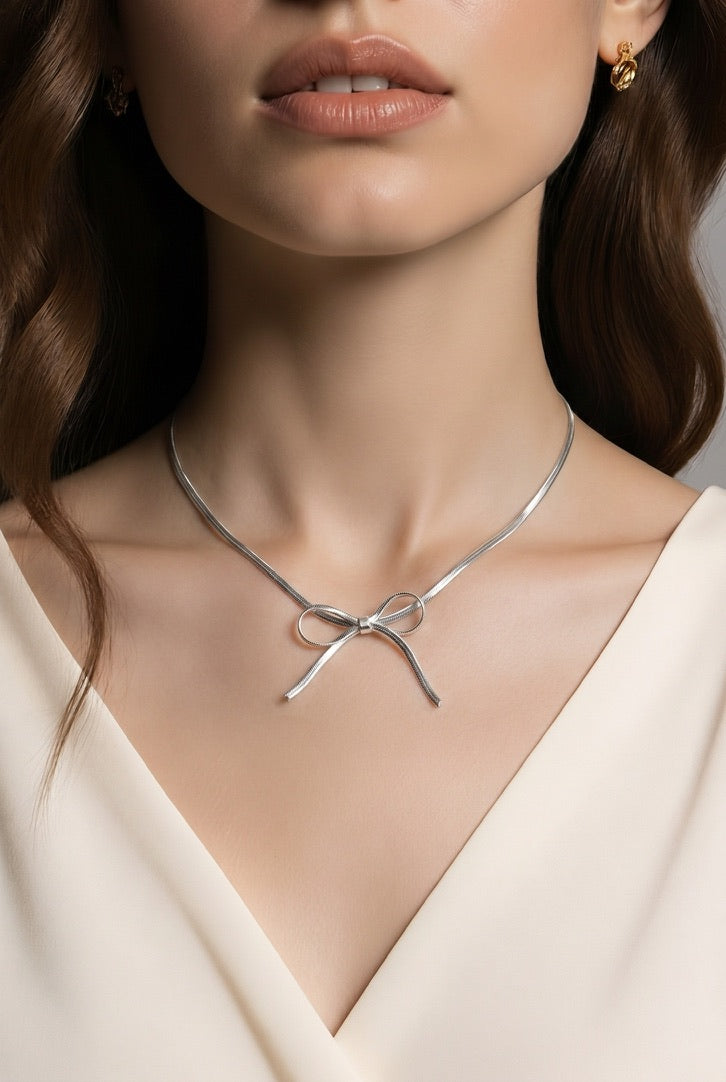 Sleek Metallic Statement Bow Choker