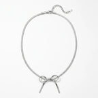 Sleek Metallic Statement Bow Choker