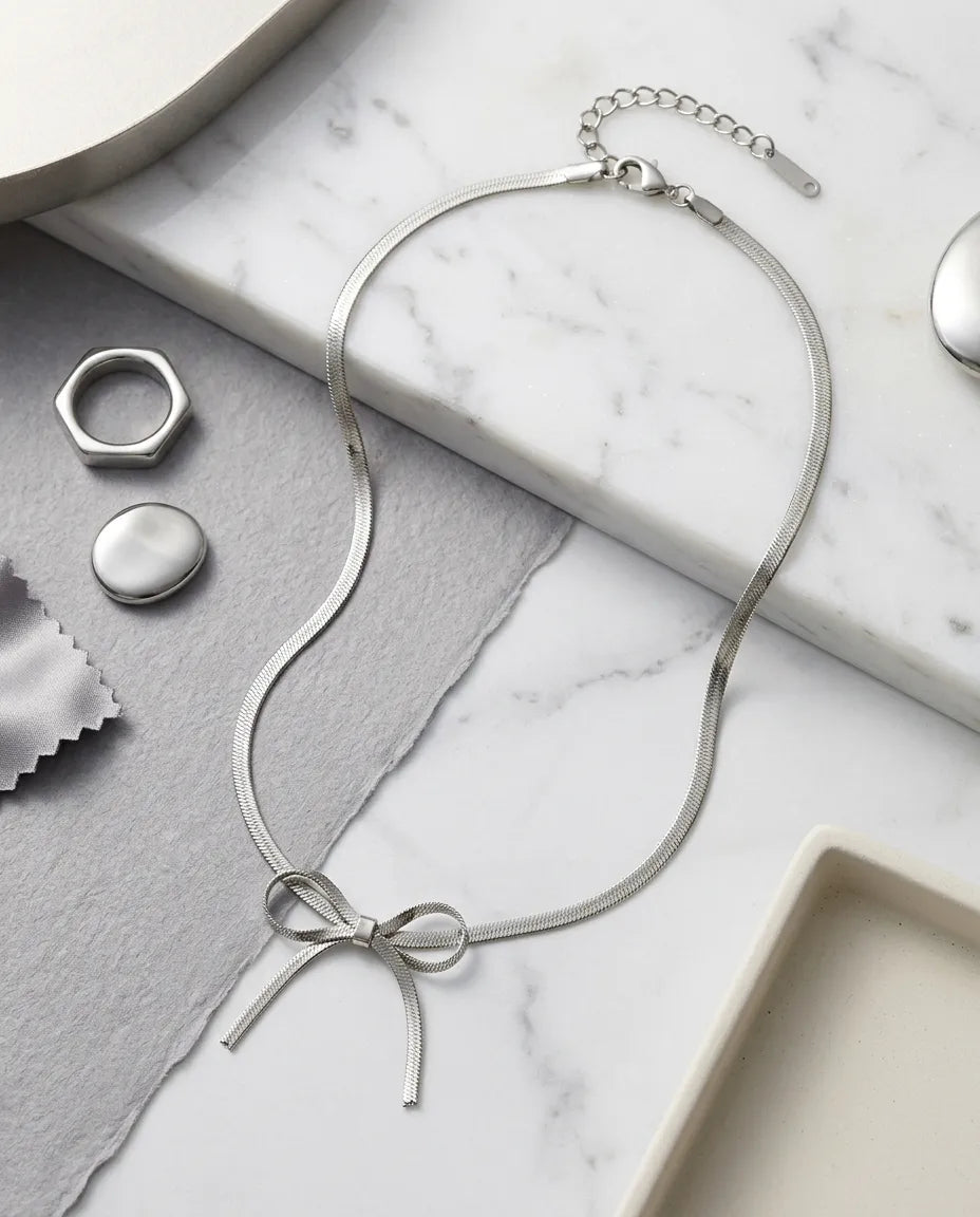 Sleek Metallic Statement Bow Choker